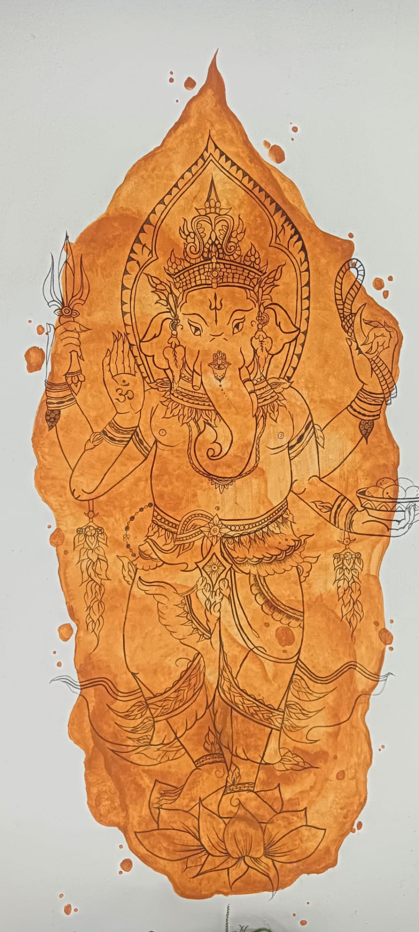 Hand-painted Ganesha wall art at Koh Shanti