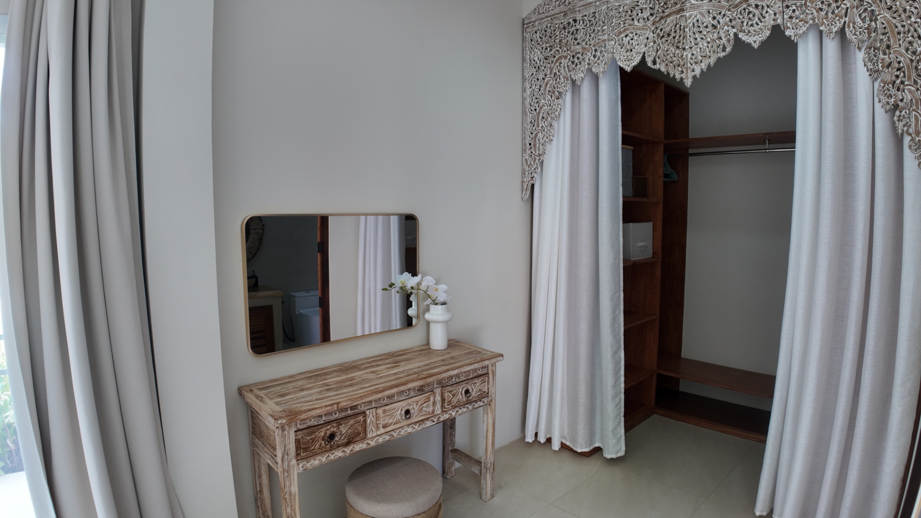 Bedroom one wardrobe and desk area at Villa Reina