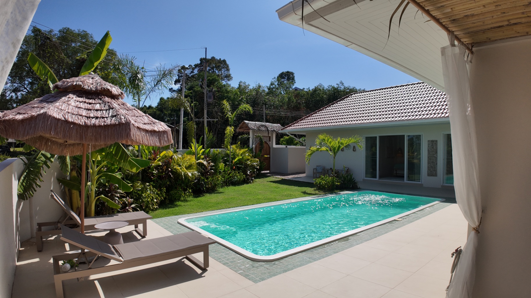 Private swimming pool and villa exterior at Villa Reina