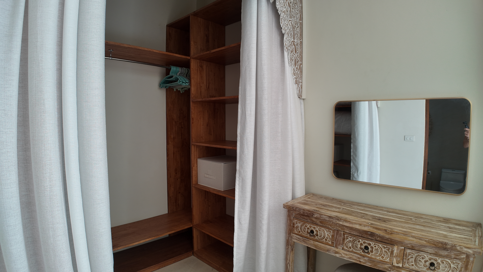 Bedroom two wardrobe and storage at Villa Reina